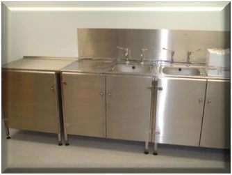 Bespoke stainless steel sink unit with storage cupboards